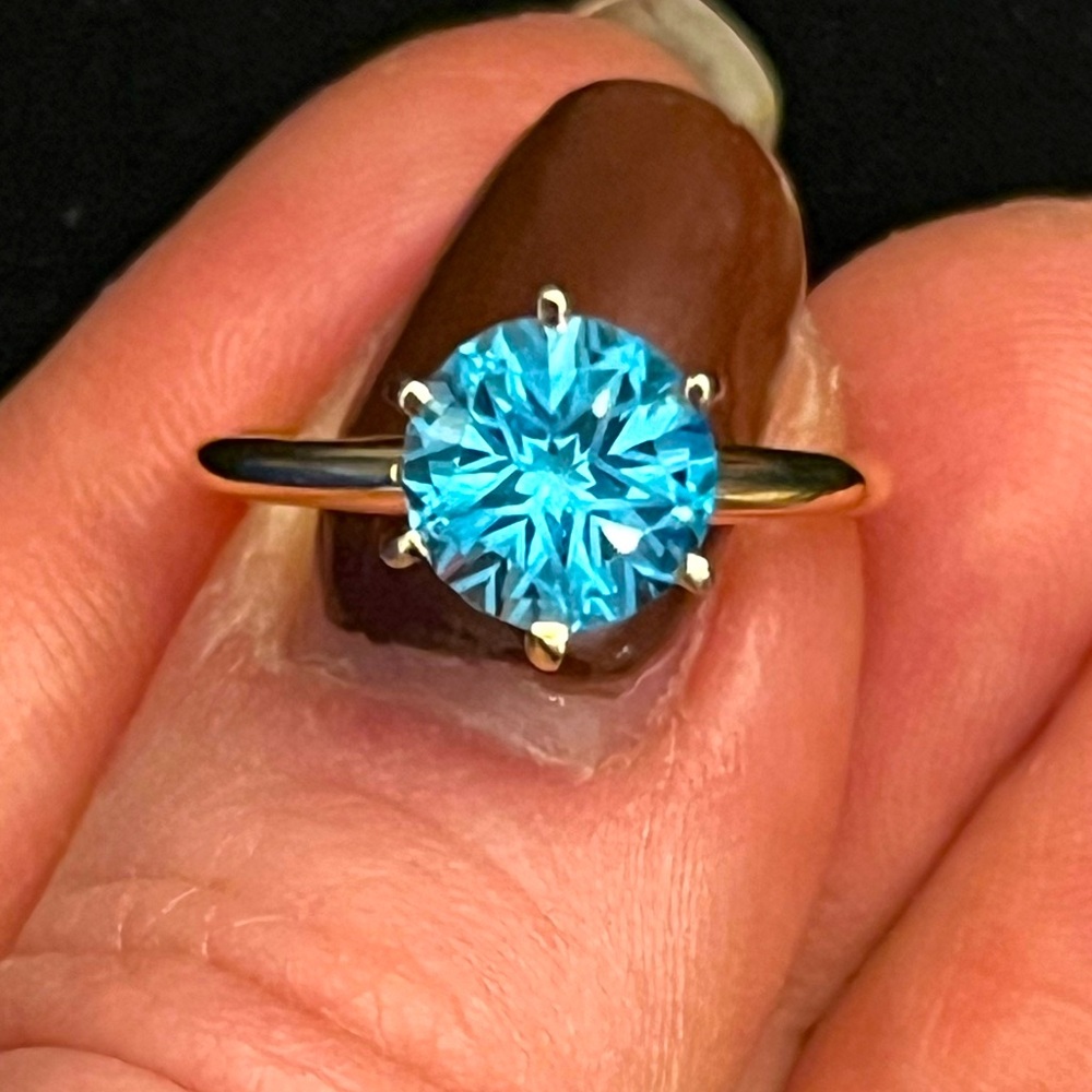 “Star” cut Blue Topaz solitaire ring